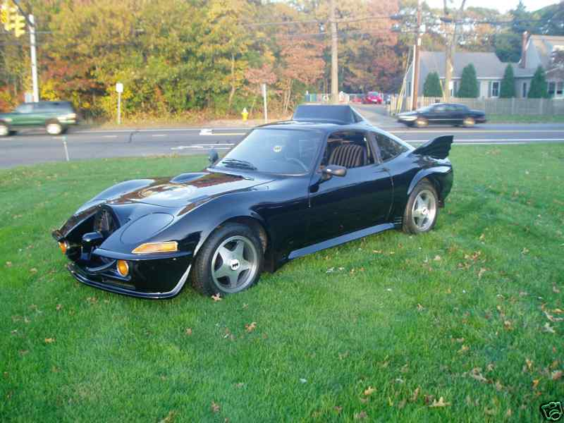 Illustration for article titled Nice Price Or Crack Pipe: Opel GT Batmobile For $9000?